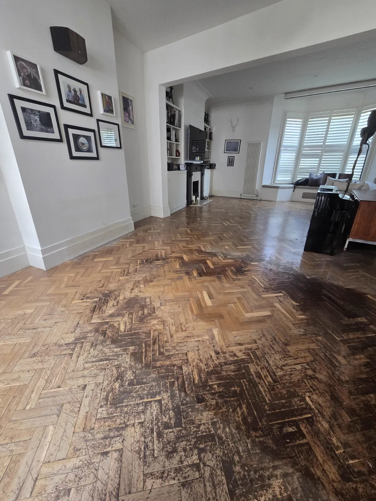 Original herringbone parquet floor in a Clapham SW4 home before restoration