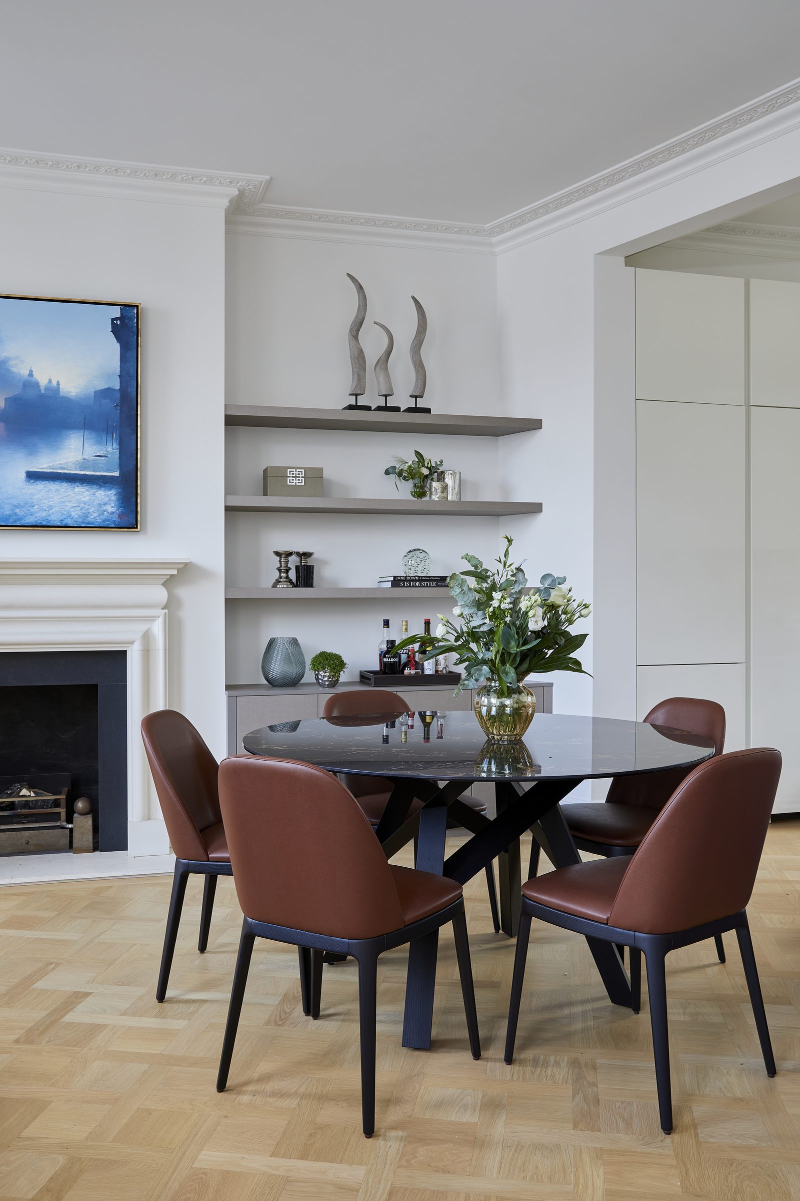 Long oak plank floor in a London dining room, supplied and installed by Howard Naish