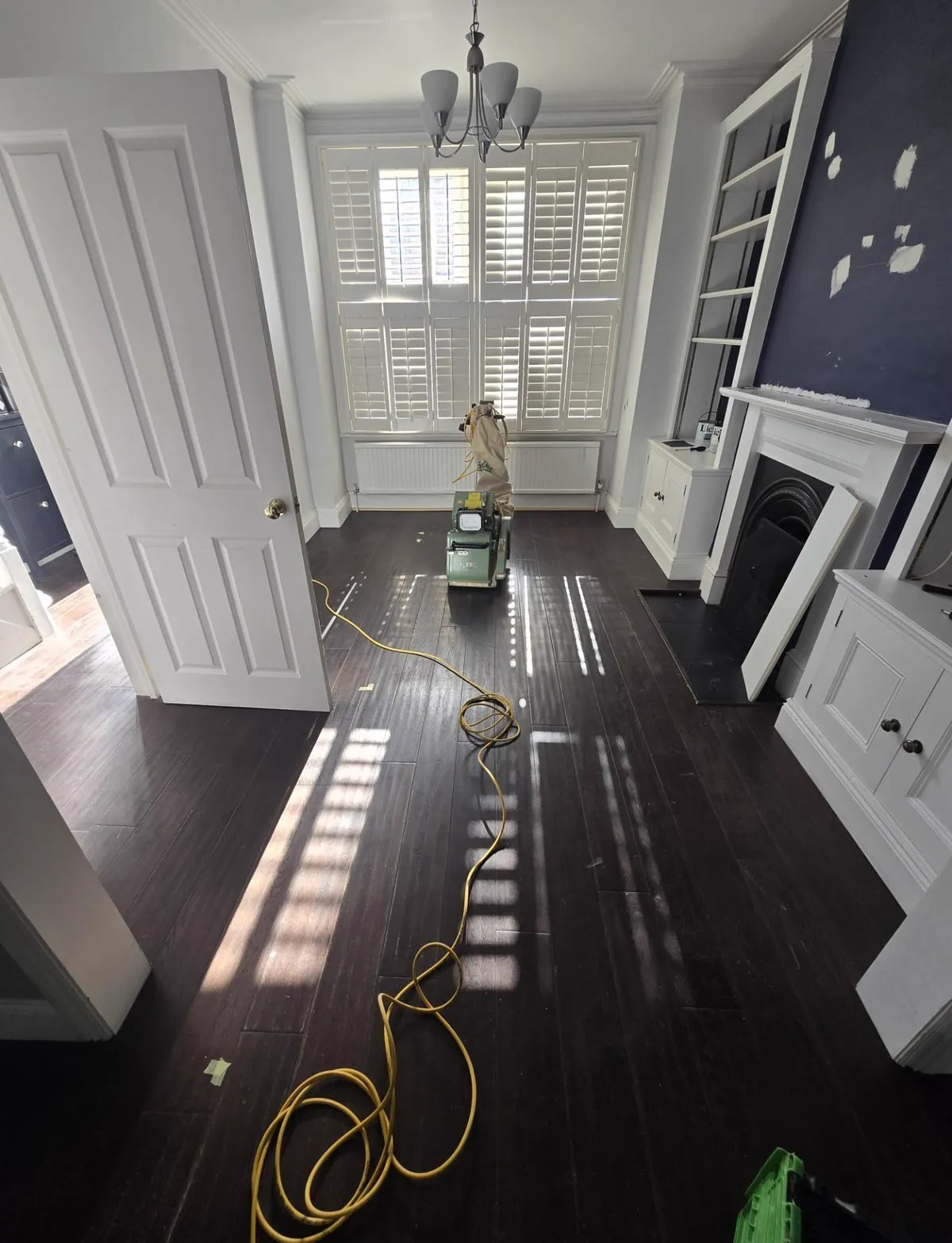 Worn oak hardwood floor before sanding