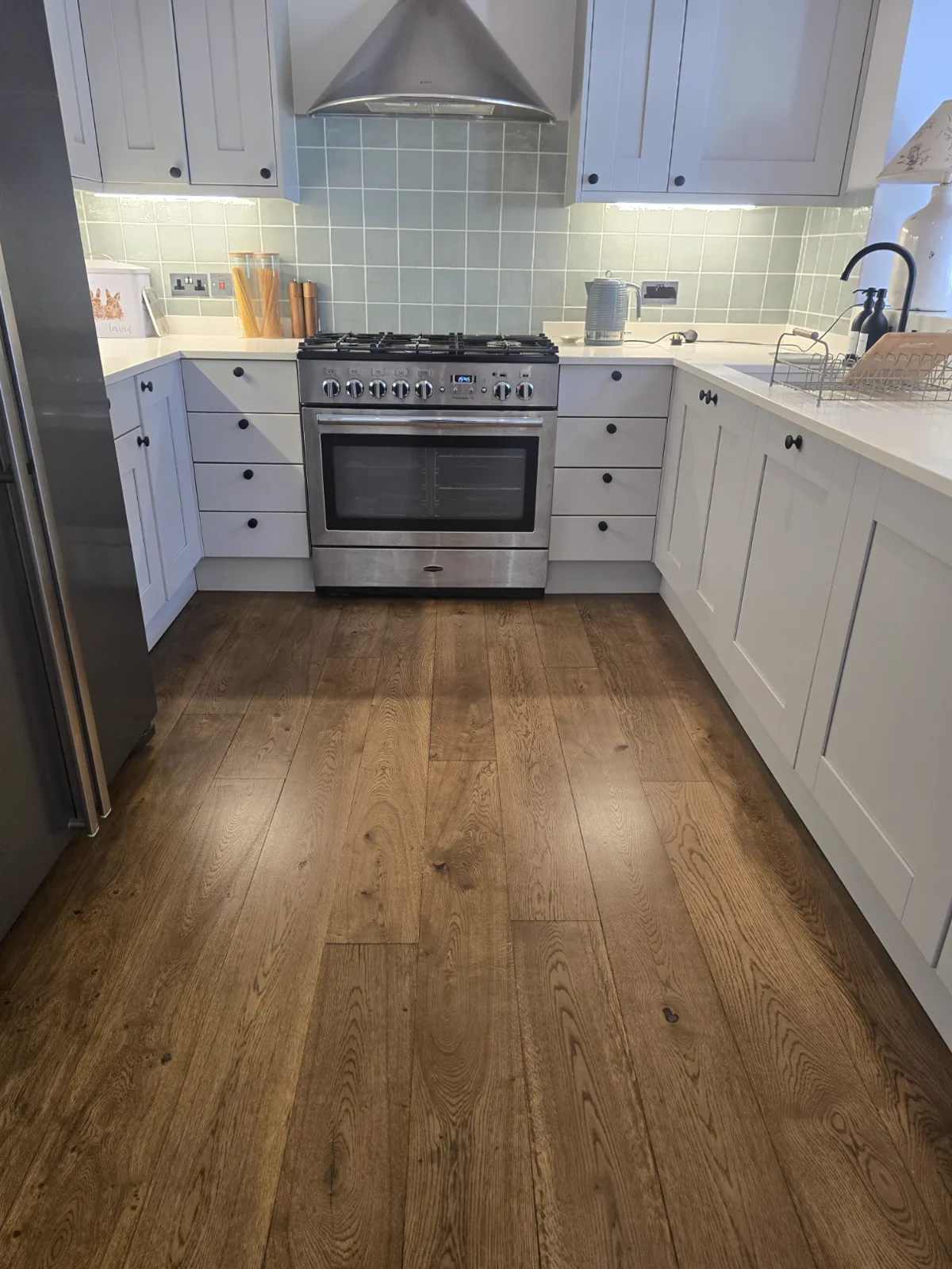 Oak kitchen floor in a Southfields SW18 Victorian terrace, restored and stained by Howard Naish
