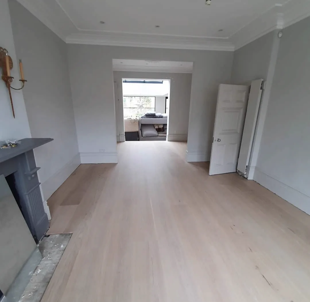 Finished pale engineered oak floor in a renovated Tooting SW17 period room, laid by Howard Naish
