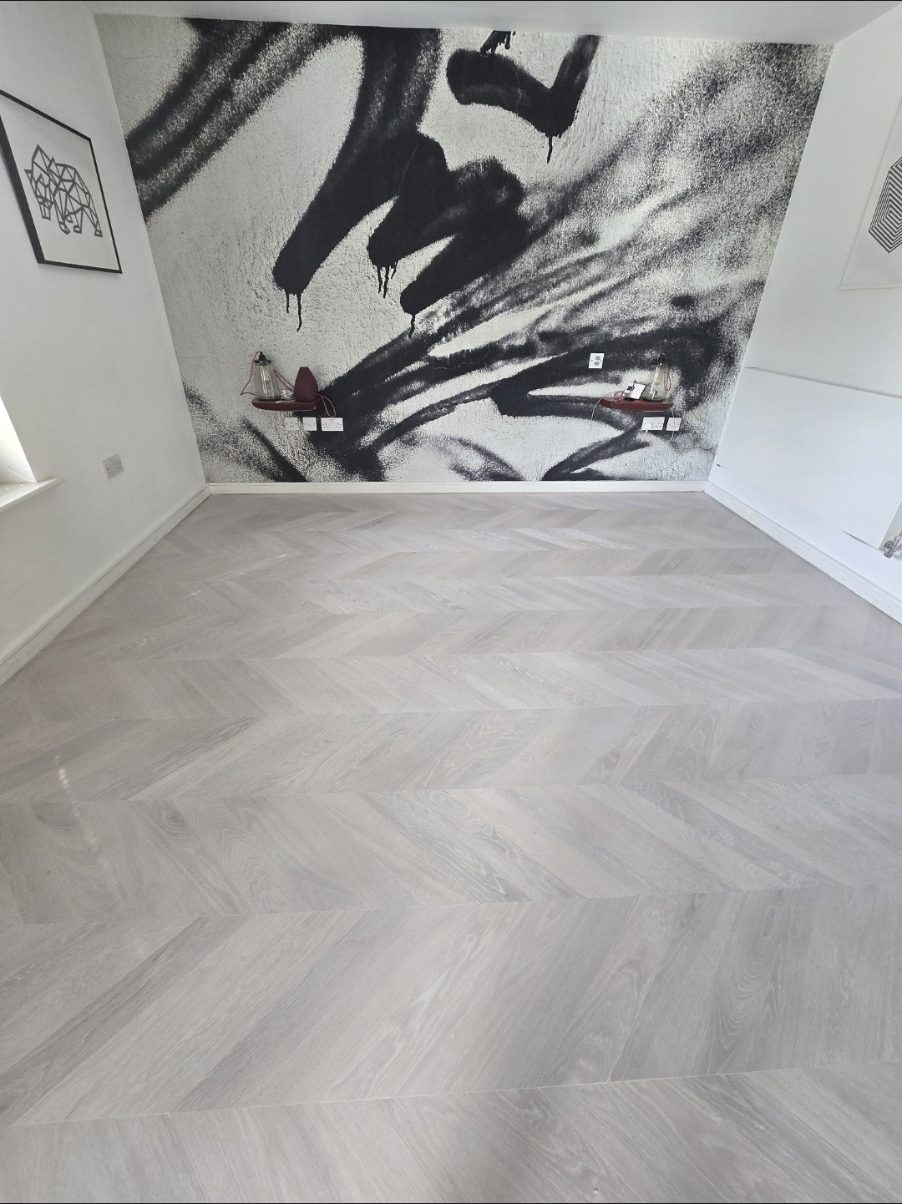 Pale grey-white oak chevron floor supplied, fitted and finished by Howard Naish in a Camberwell SE5 home